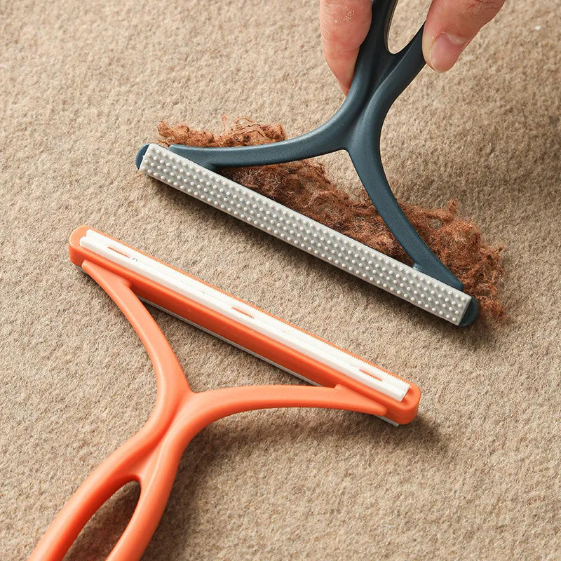 Brosse double face anti-poils chien.  Efficace sur meubles, vêtements et sols.  Ergonomique.