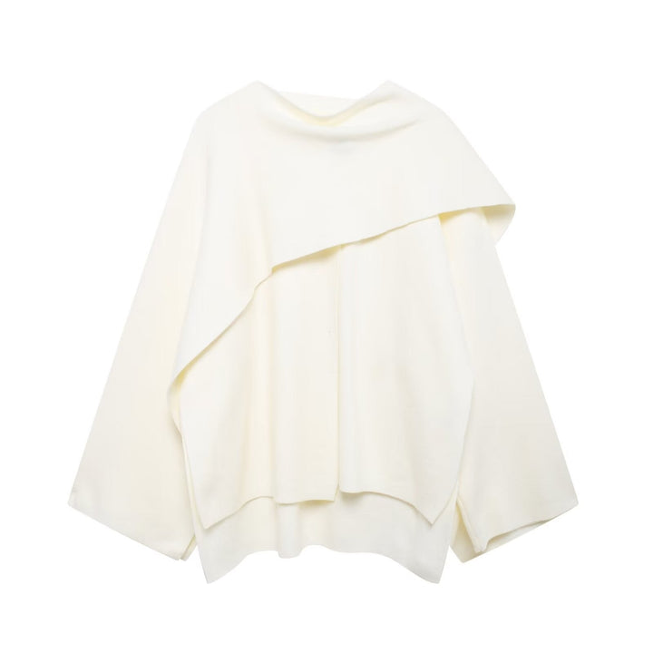 Veste cape femme asymétrique. Mode chic oversize, confortable pour un look moderne toute l'année.