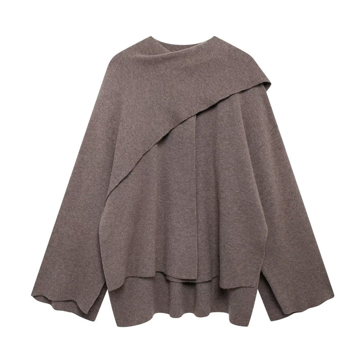 Poncho asymétrique femme. Confortable et élégant, parfait pour la mode mi-saison et l'hiver.