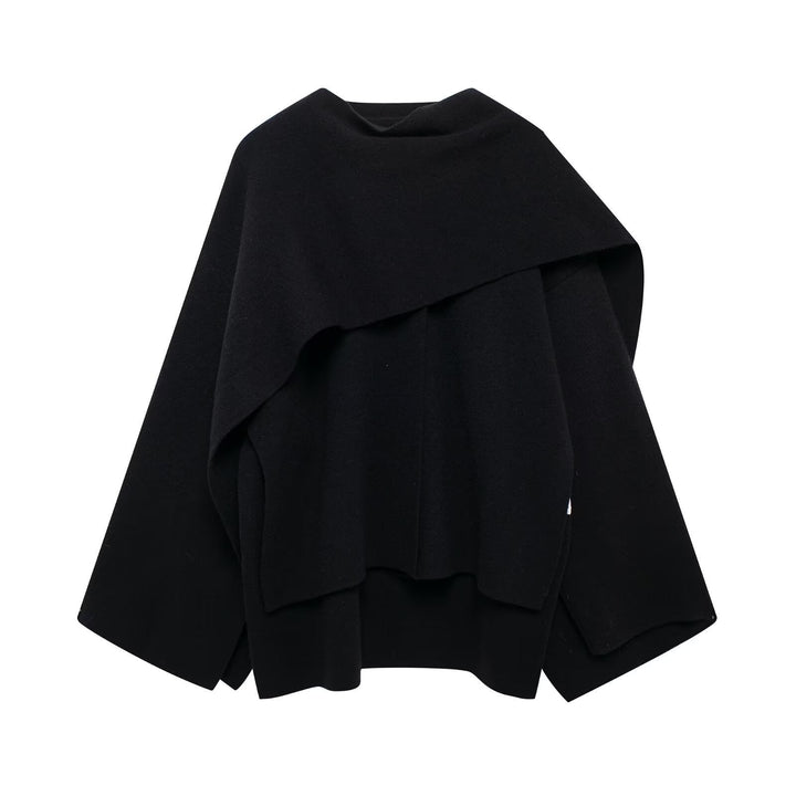 Cape femme moderne et chic. Design asymétrique oversize pour un look élégant et confortable.