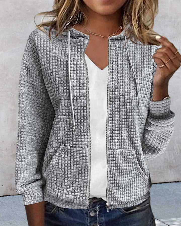 Cardigan Amara pour femme avec poches, style polyvalent, parfait pour une superposition chic et mode.