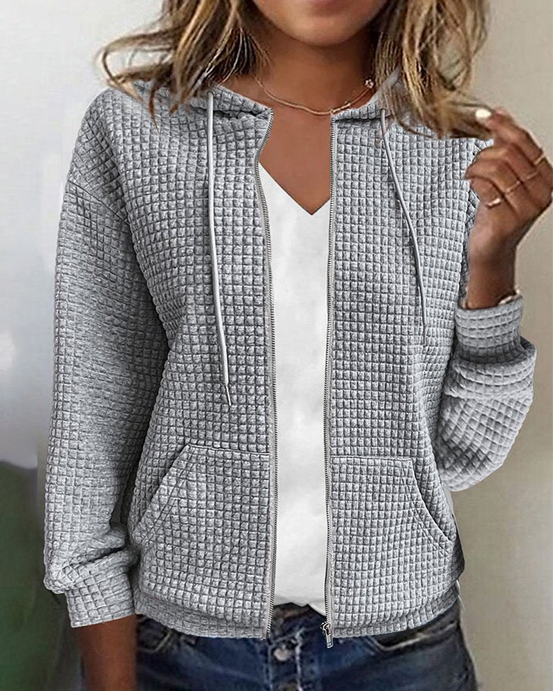 Cardigan femme doux et confortable, poches, coupe décontractée.