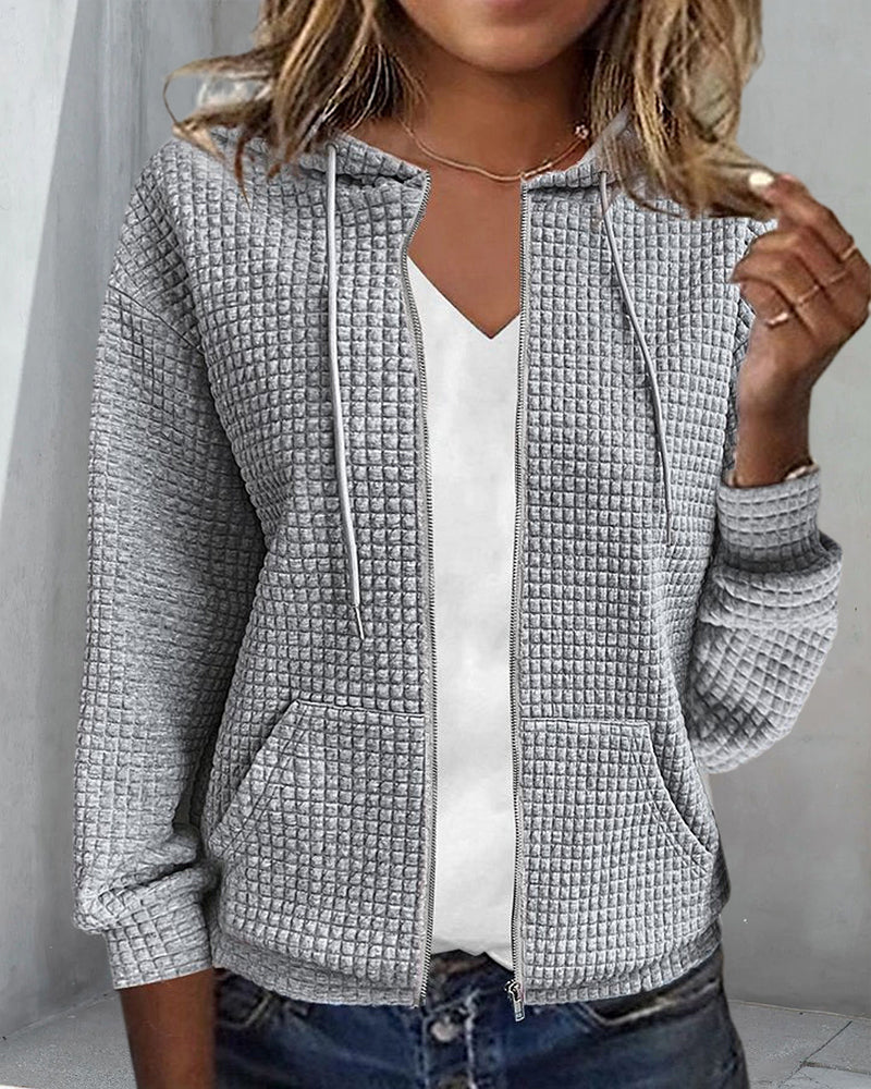 Cardigan femme doux et confortable, poches, coupe décontractée.