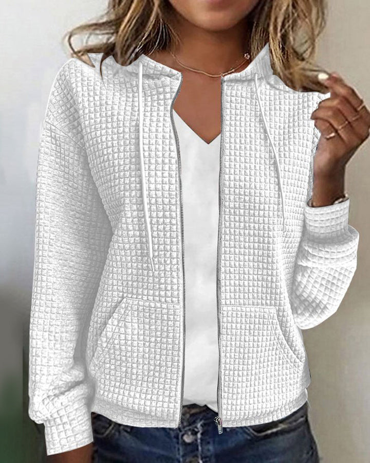 Cardigan femme doux et confortable, poches, coupe décontractée.