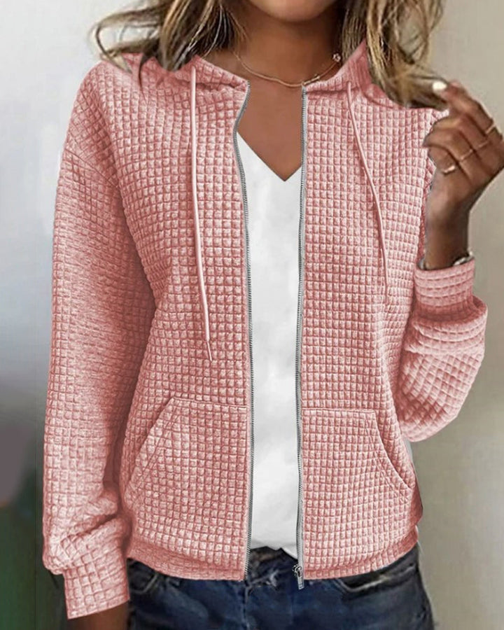 Cardigan femme doux et confortable, poches, coupe décontractée.