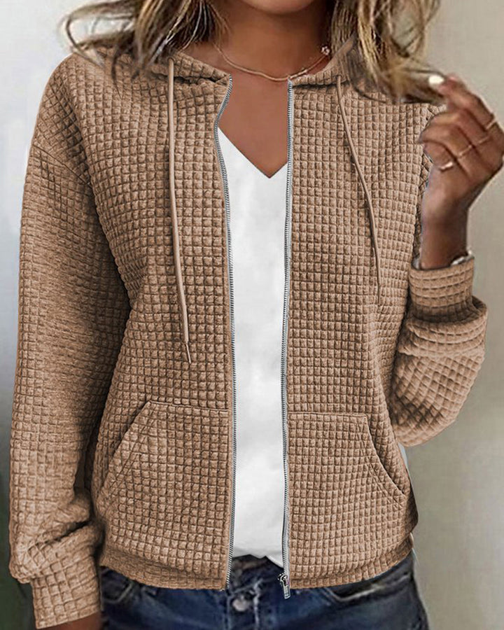 Cardigan femme doux et confortable, poches, coupe décontractée.