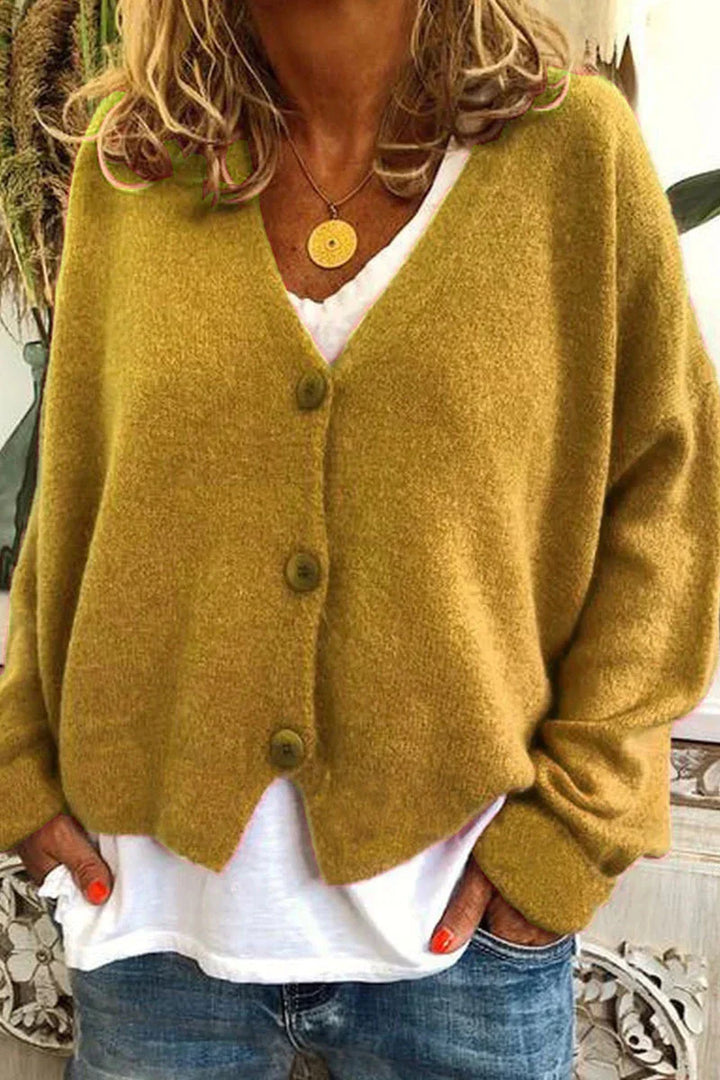 Cardigan patchwork chic pour femme, avec col en V et manches longues, idéal pour un layering confortable.