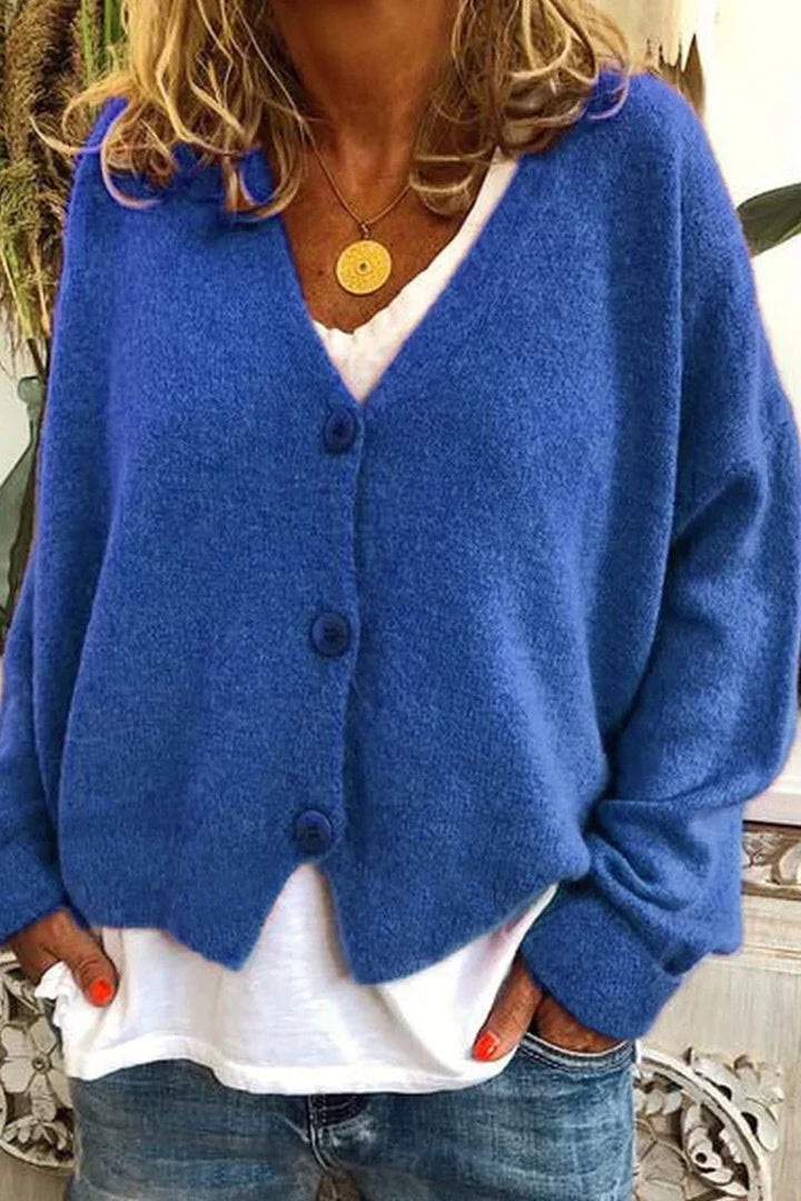 Magnifique cardigan femme patchwork, manches longues, pour une touche chic et confortable.