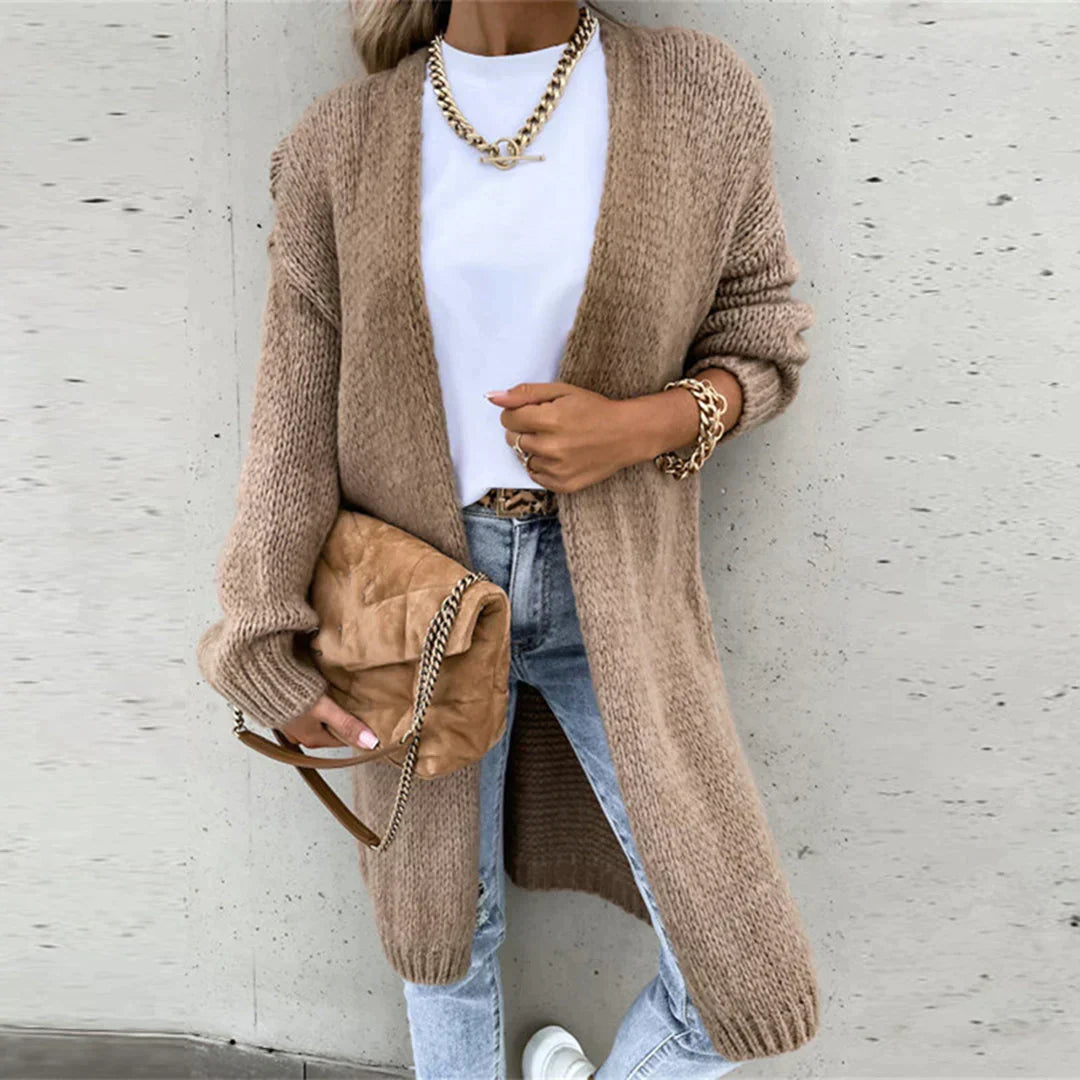 Cardigan long oversize rose femme, élégance et confort, idéal pour un look décontracté chic.
