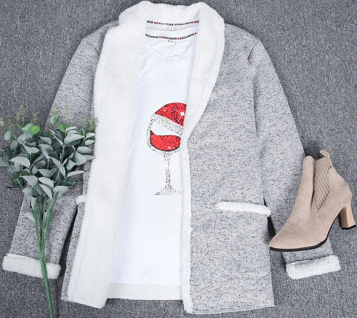 Cardigan ouvert femme, coupe ample et fluide, manches longues.  Confort et style. Plusieurs tailles disponibles.