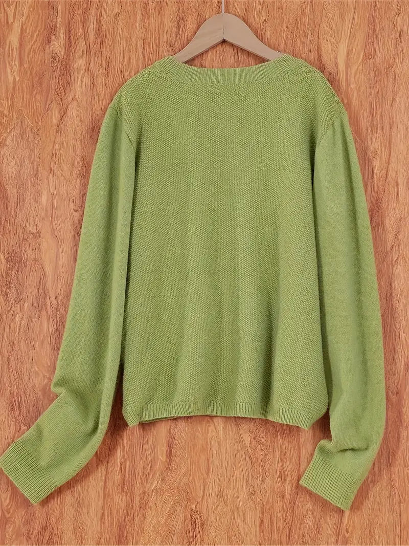 "Cardigan oversize pour femme, couleur pastel, doux et confortable, parfait pour un style décontracté et élégant quotidien."