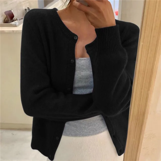 Gilet cardigan femme Sydney chic et ample, parfait pour un style élégant et polyvalent.