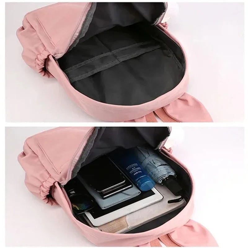 Cartable enfant, design mignon, compartiments multiples, porte-clés inclus. Idéal rentrée scolaire.