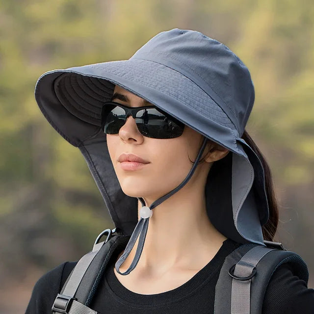 Chapeau de randonnée femme anti-UV, léger et respirant, avec protection cou pour le soleil estival.