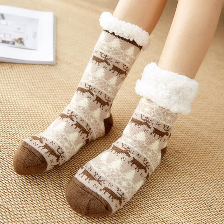 Cadeau idéal pour femme: chaussettes chaudes et antidérapantes, un essentiel pour affronter l'hiver.
