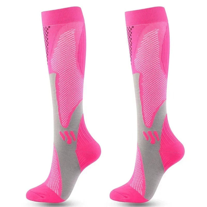 Chaussettes de compression noires et grises, renforcées, pour confort et circulation optimale, idéales sport et daily use.