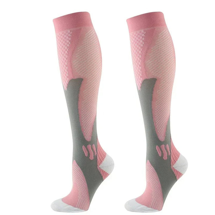 Chaussettes de compression noires et grises, renforcées, pour confort et circulation optimale, idéales sport et daily use.
