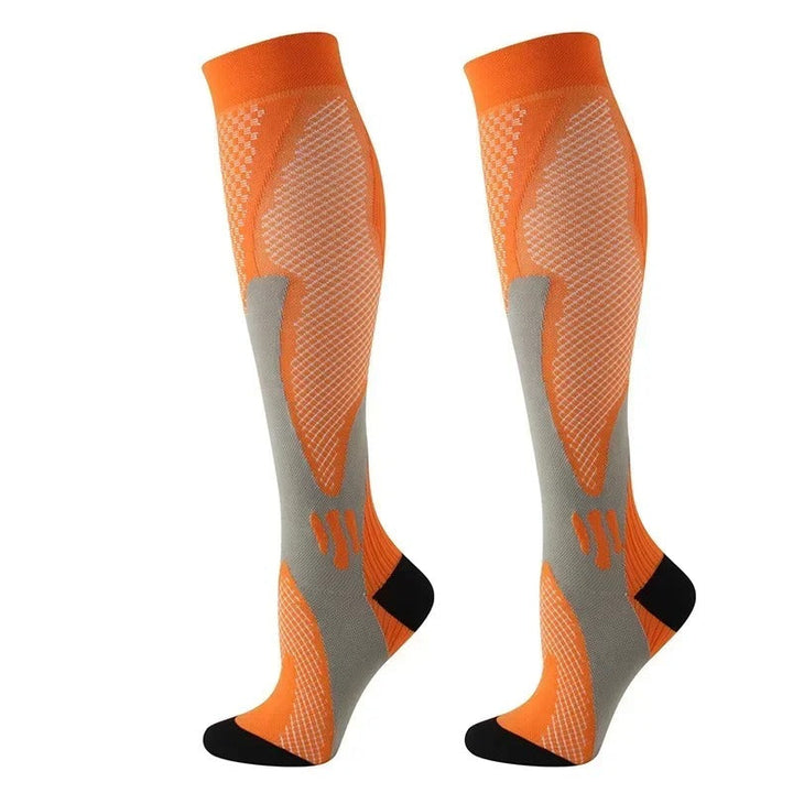 Chaussettes de compression noires et grises, renforcées, pour confort et circulation optimale, idéales sport et daily use.