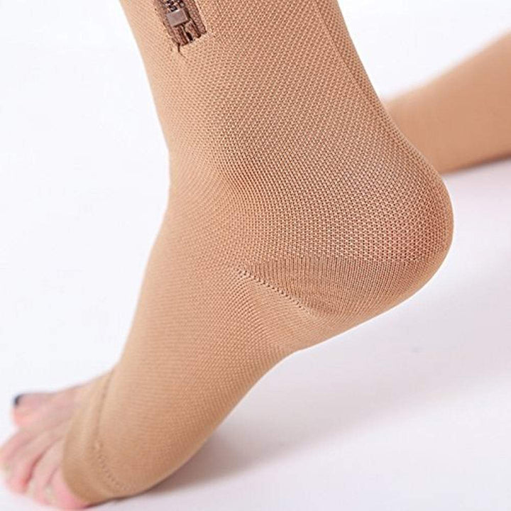 Chaussettes de compression unisexe 20-30 mmHg pour soulager les jambes lourdes, soutien veineux et anti-gonflement. Confort quotidien.