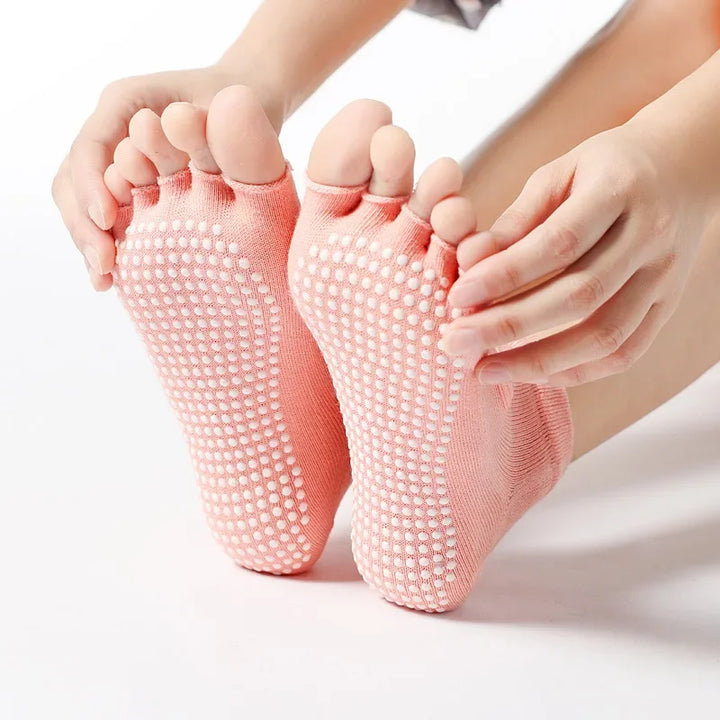 Chaussettes de sport antidérapantes à cinq orteils pour femme, idéales pour Pilates et activités au sol.