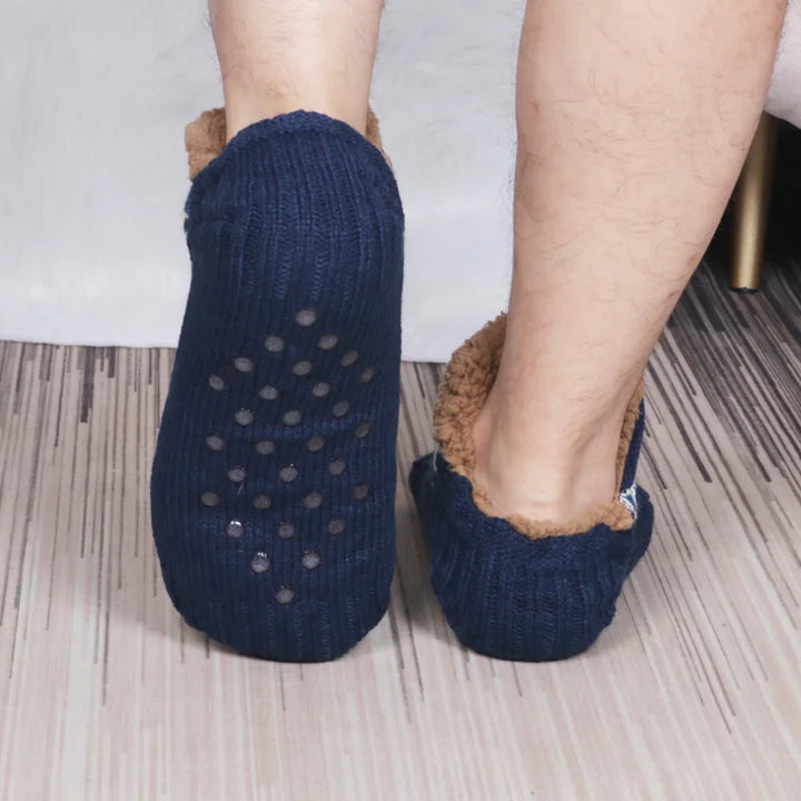 Chaussettes cocooning chaudes et antidérapantes, offrant un confort douillet pour vos pieds en hiver.