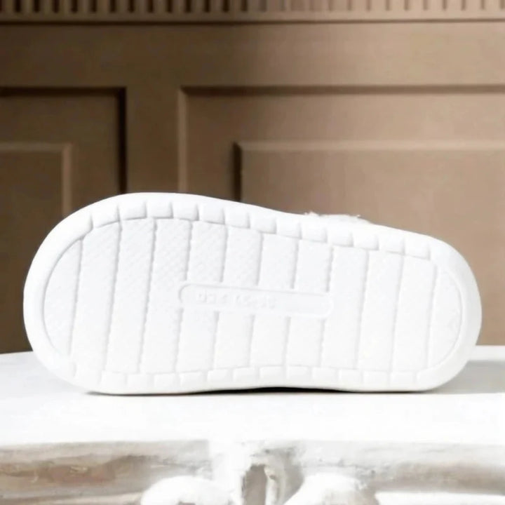 Chaussons antidérapants pour femmes, confortables et chauds, avec semelle sécurisée pour l'intérieur.