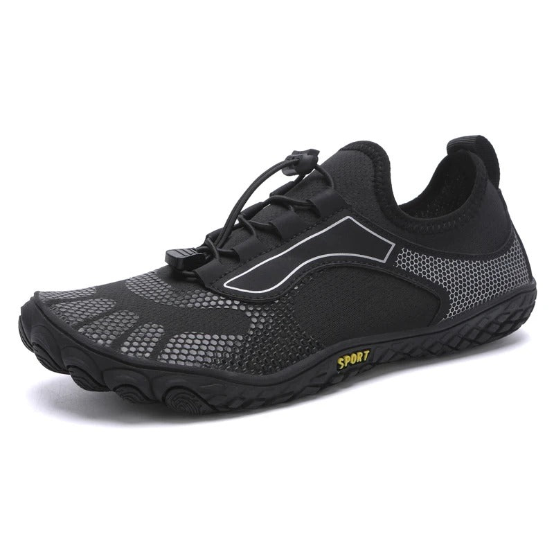 Chaussures aquatiques unisexe noires avec design minimaliste pour un effet pieds nus naturel.