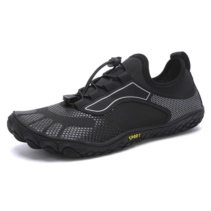 Chaussures aquatiques unisexe noires avec design minimaliste pour un effet pieds nus naturel.