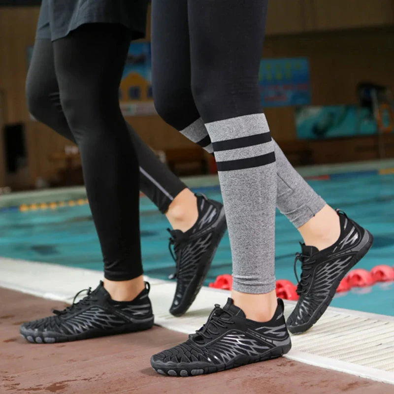 Chaussures aquatiques souples "pieds nus" pour la natation, le surf et la marche. Confort et séchage ultra-rapide.