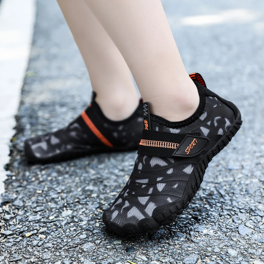 Confort pieds nus avec ces chaussures d'eau pour enfants, séchage rapide, parfaites pour l'extérieur.