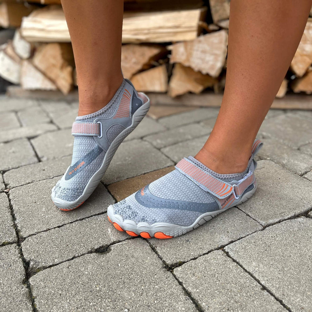 Chaussures d'eau effet pieds nus, ultra-flexibles pour confort en mer, plage et randonnée.