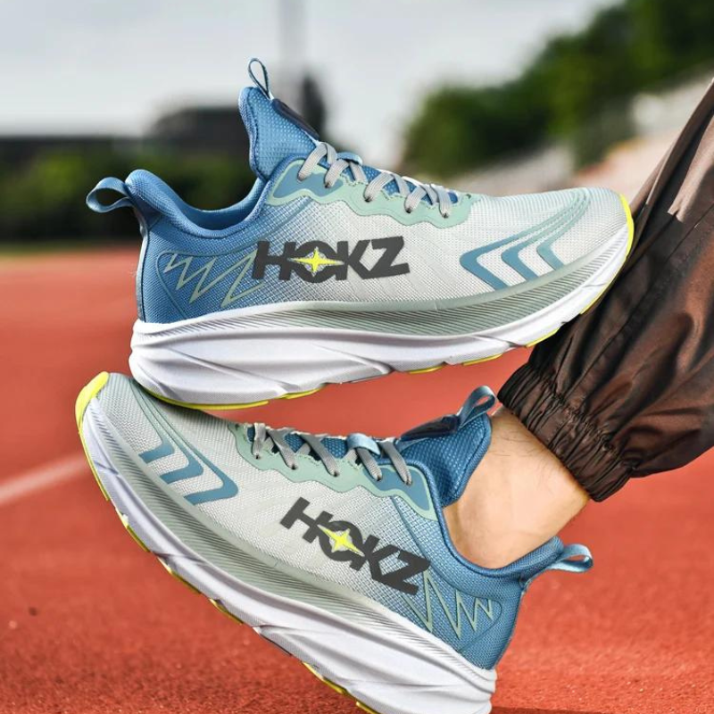 Chaussures de course légères pour femme, bleu, vue latérale avec amorti visible.