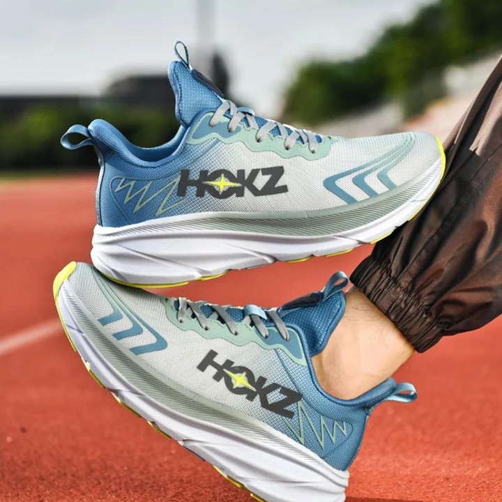 Chaussures de course légères pour femme, bleu, vue latérale avec amorti visible.