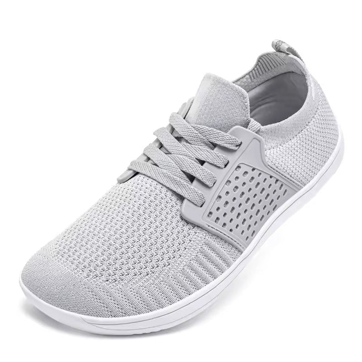 Chaussures de marche homme larges, minimalistes et modernes, parfaites pour le quotidien et les activités outdoor.