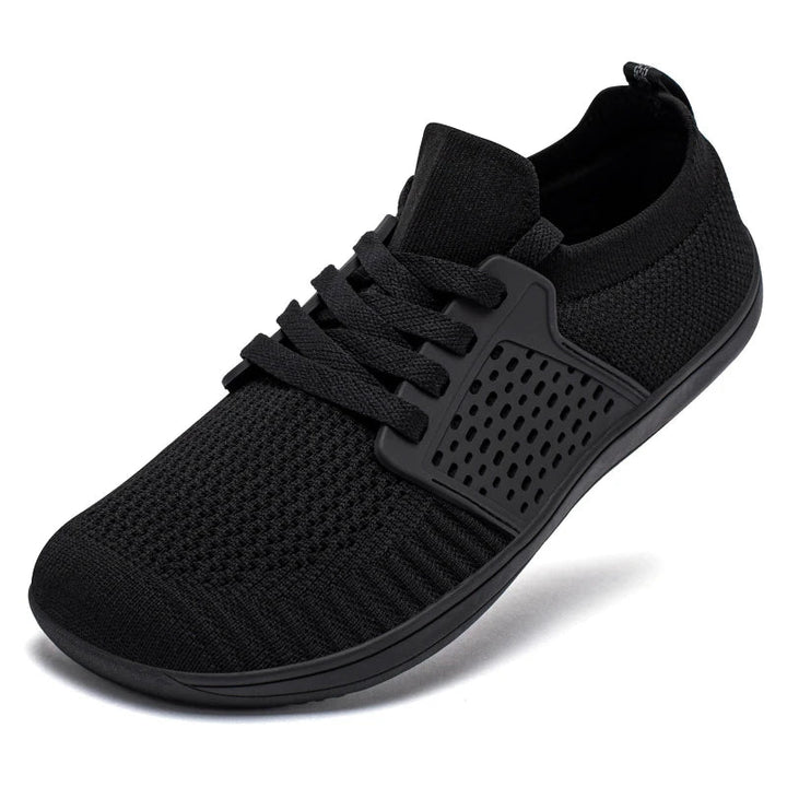 Chaussures homme minimalistes larges, parfaites pour la marche en ville, style athlétique et confort durable.