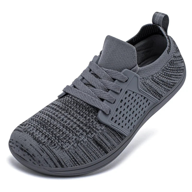 Chaussures de marche larges pour homme, minimalistes, performantes, idéales pour un confort supérieur et athlétique.