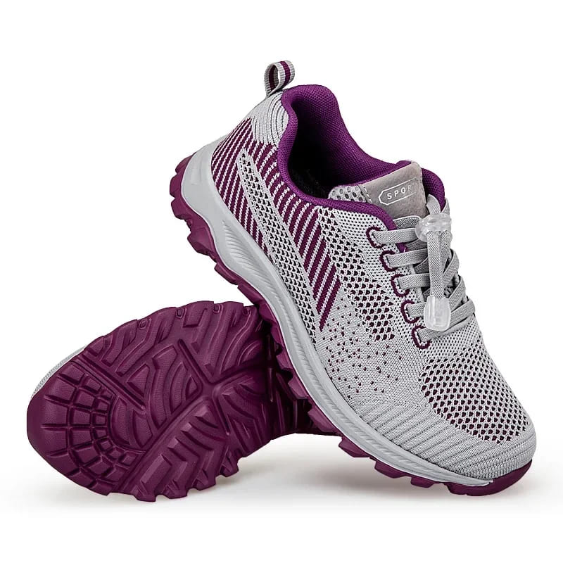 Paire de chaussures de marche unisexes, confortables et antidérapantes, conçues pour le sport et l'extérieur.