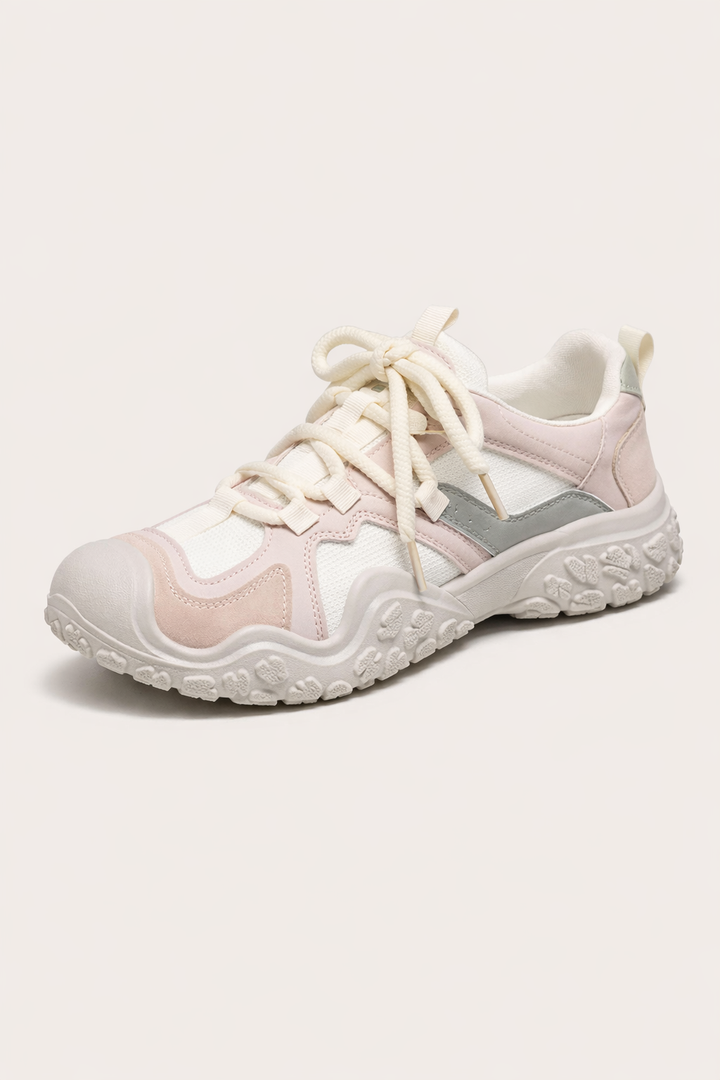 Baskets de sport roses pour femme, semelle antidérapante, confort maximal pour la course et activités sportives.