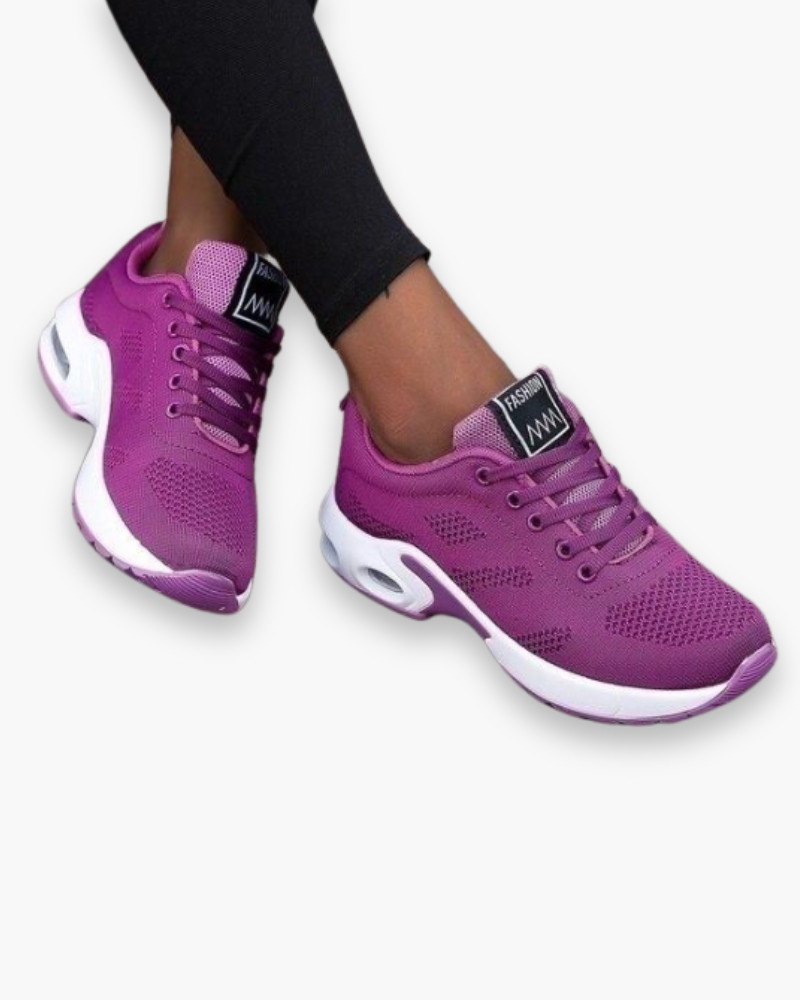 "Chaussures de sport légères pour femme, design moderne, tissu respirant et semelle amortissante, vue profil"