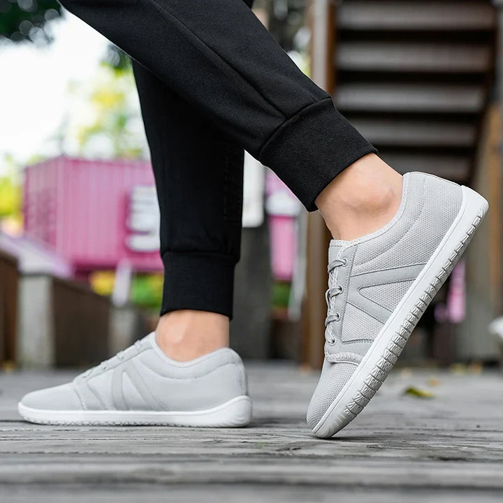 Chaussures minimalistes unisexes pour pieds larges, confortables et respirantes pour usage quotidien en extérieur.