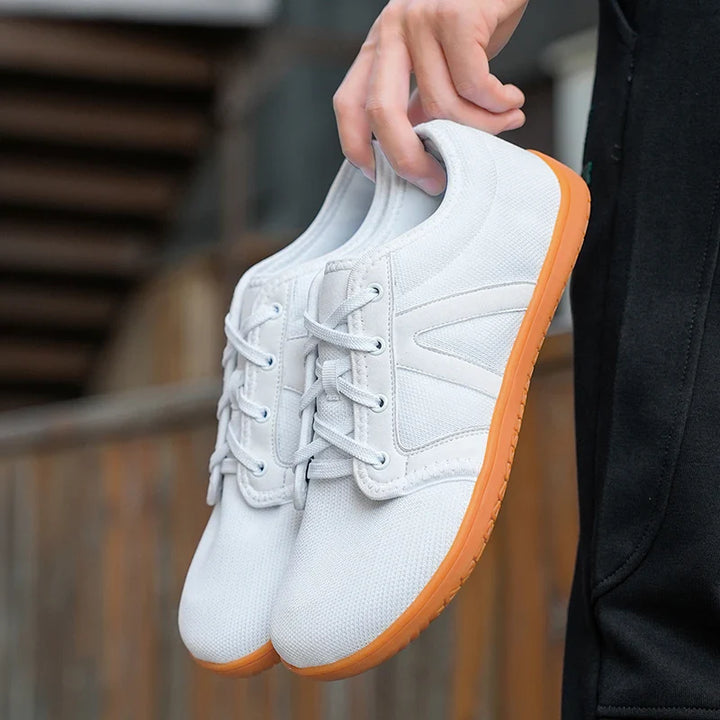 Confortables chaussures minimalistes unisexes pour pieds larges, design respirant, parfaites pour l'extérieur.
