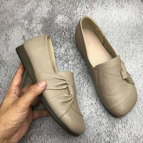 Intérieur rembourré de chaussure orthopédique, assurant confort maximal et soulagement pour douleur au pied.