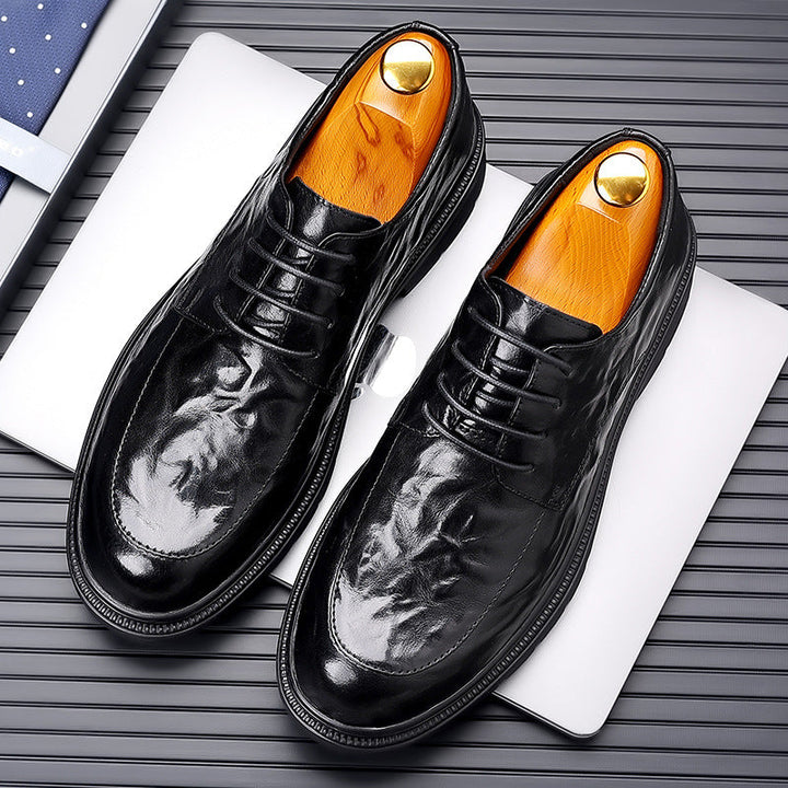 "Chaussures Oxford homme en cuir grainé, élégantes et durables, idéales pour événements formels, vue de face"