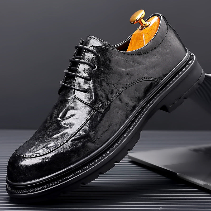 "Chaussures Oxford homme en cuir grainé, élégantes et durables, idéales pour événements formels, vue de face"