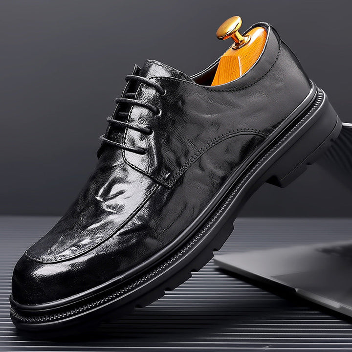 "Chaussures Oxford homme en cuir grainé, élégantes et durables, idéales pour événements formels, vue de face"