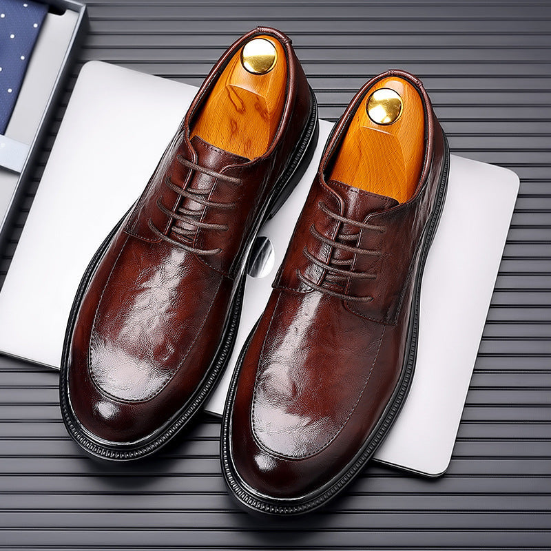 "Chaussures Oxford homme en cuir grainé, élégantes et durables, idéales pour événements formels, vue de face"