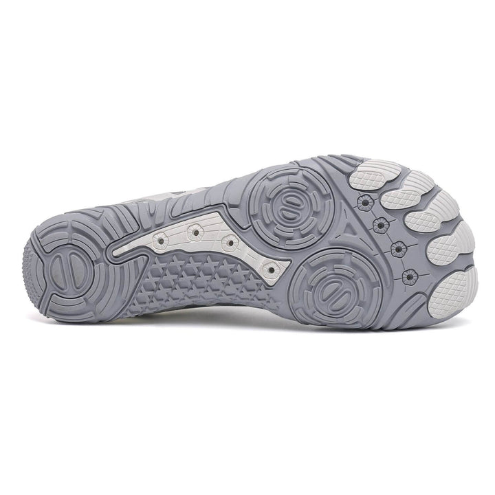 Chaussures pieds nus flexibles encourageant mouvement naturel et confort des orteils, parfaites pour le sport.
