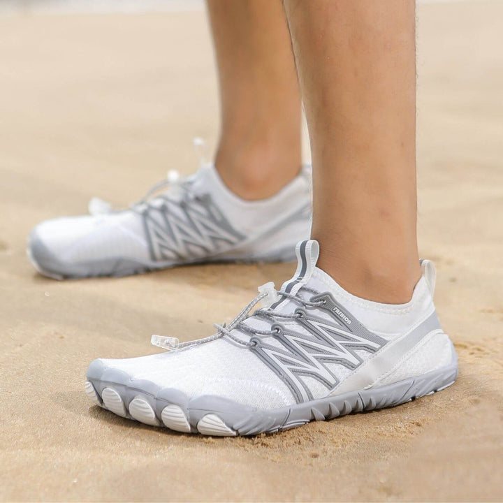 Chaussures minimalistes pieds nus, souples et confortables, pour une expérience de marche naturelle et saine.