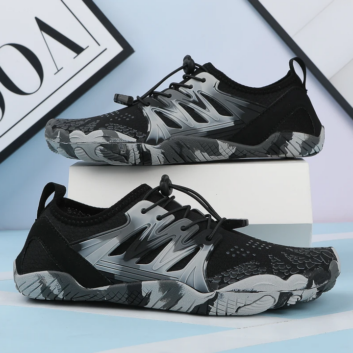 Chaussures de sport respirantes pour hommes, idéales pour la marche ou la course. Conception minimaliste et légère.