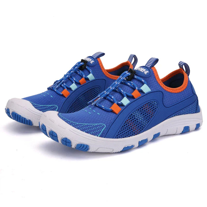 Chaussures pieds nus VitaSole noires, design minimaliste et souple pour liberté de mouvement.